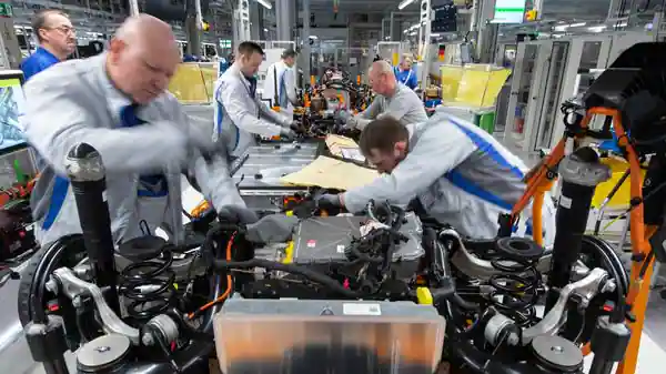 Hot US economy, fresh supply disruptions pressure world’s factories
