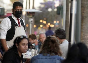 Regulators withdraw controversial California work mask rules