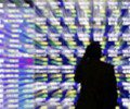 Global stocks tick up and bond yields dip after sell-off